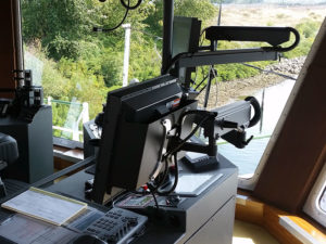 industrial counterbalanced articulating arm mount for computer monitor in boat bridge